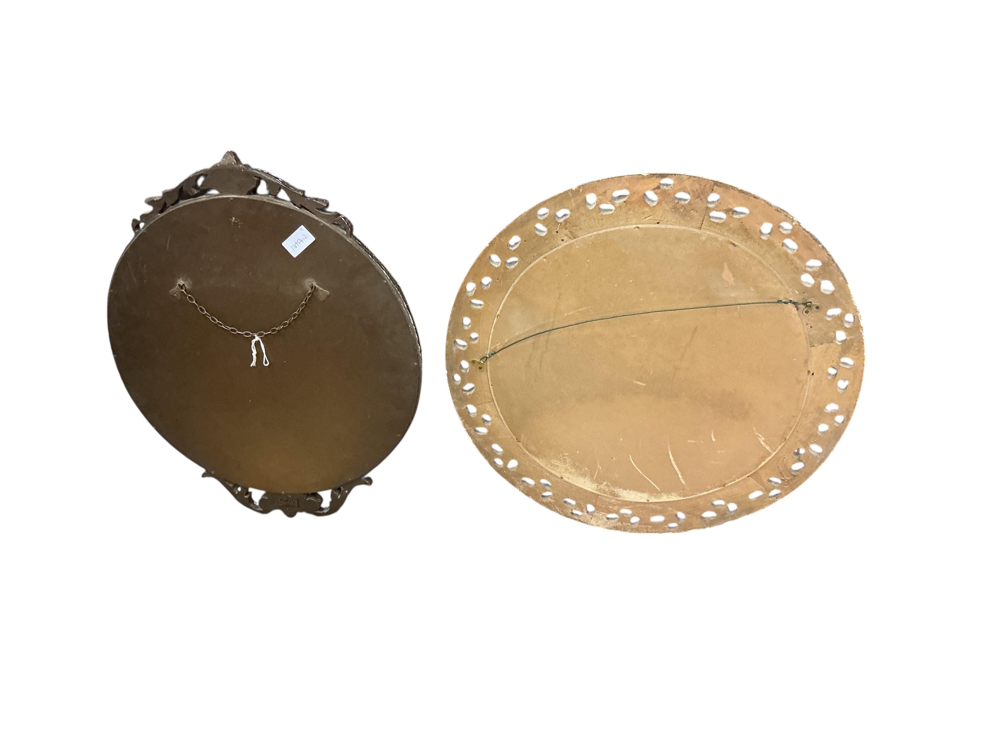 An early 20th century giltwood convex wall mirror, diameter 56cm together with one other circular wall mirror